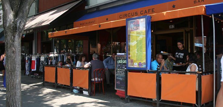 street view of circus cafe with orange sign